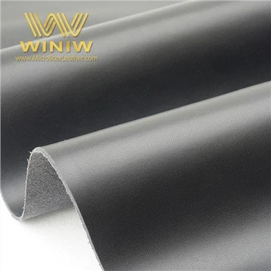 Overdel i skinnmateriale